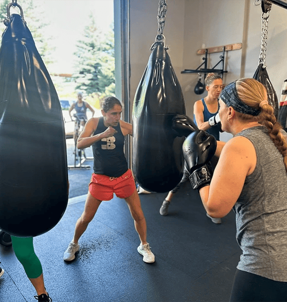 People boxing at BOXiT Fitness Studio